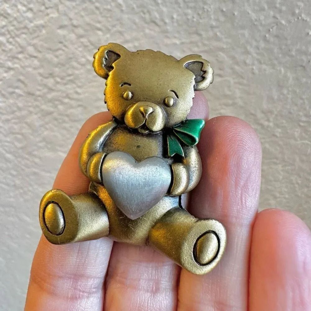 Jeanette Jewelry Gold and Silver tone Bear holding a heart brooch